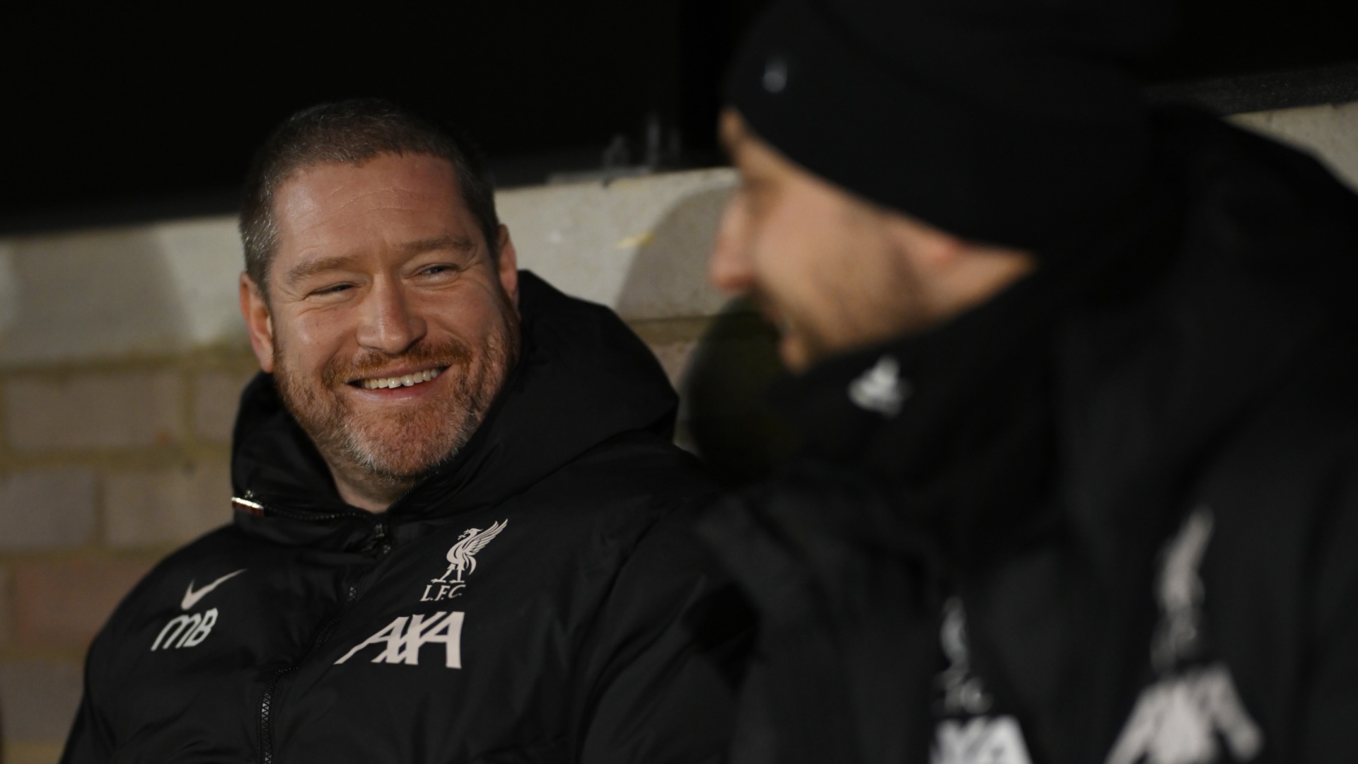 Matt-Beard-in-liverpool-tracksuit-smiling.jpg